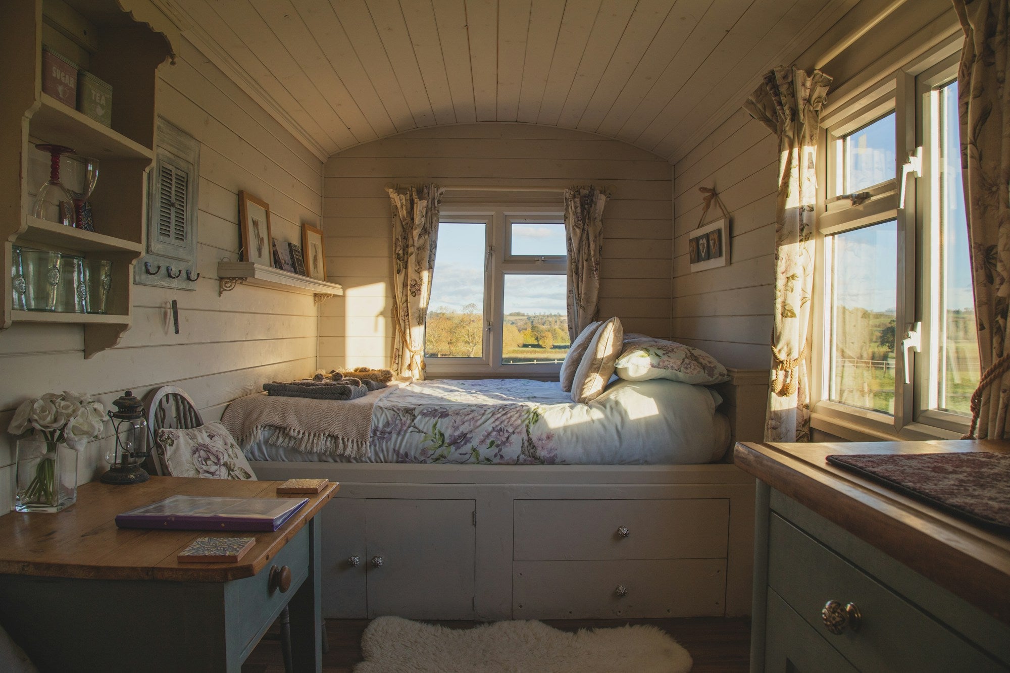 Styled bedroom with cream cotton bedding