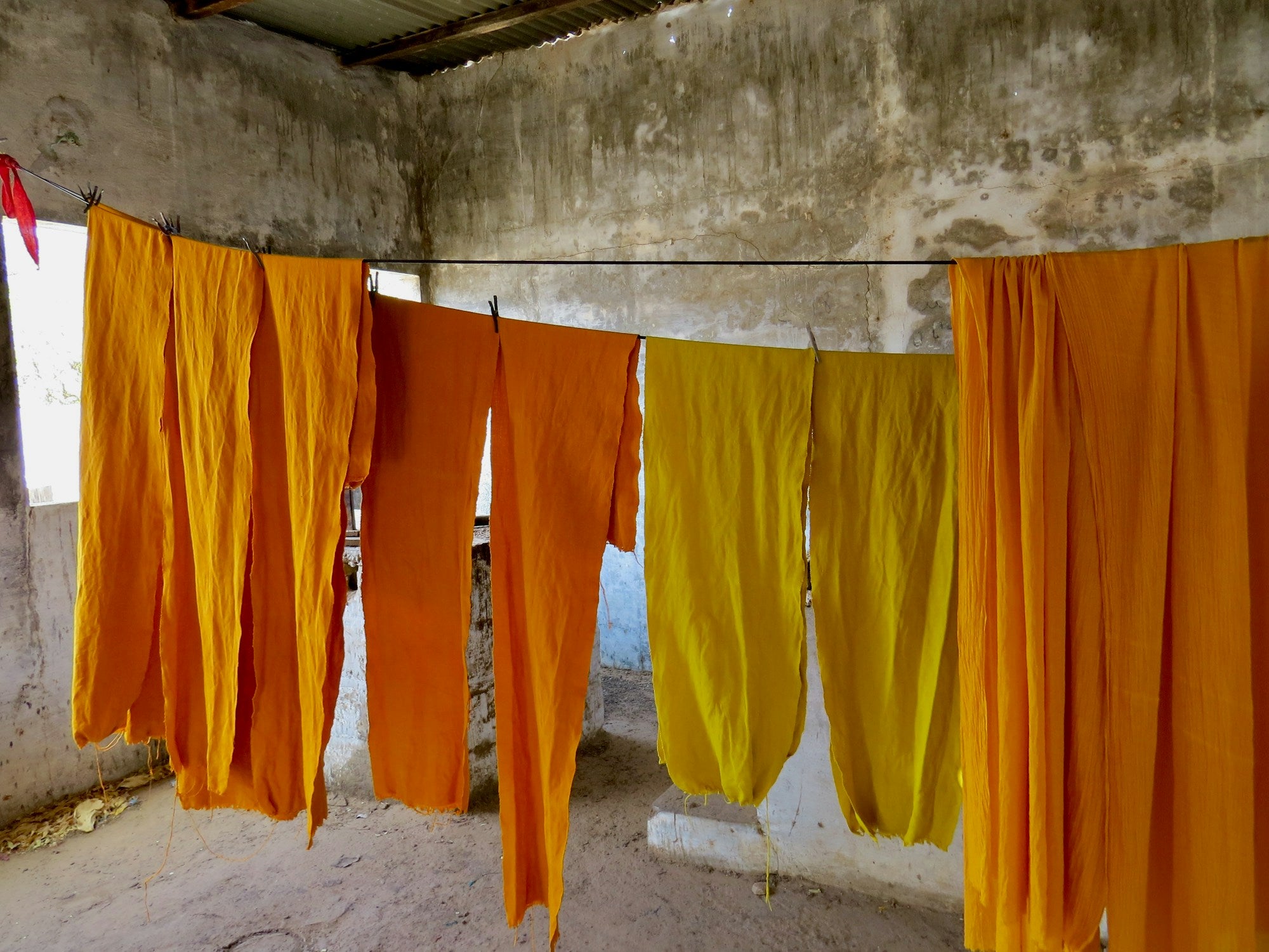Block-printed fabric drying in the sun